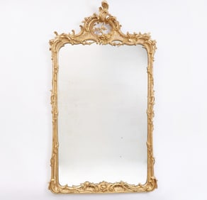 A Louis XV Carved Giltwood Mirror