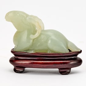 A Chinese Celadon Jade Carving of a Ram Qing Dynasty