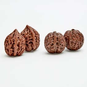 Two Pairs of Chinese Carvedf Walnut Shells 20th Century