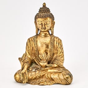 A Chinese Parcel Gilt Bronze Figure of Buddha 17th-18th century