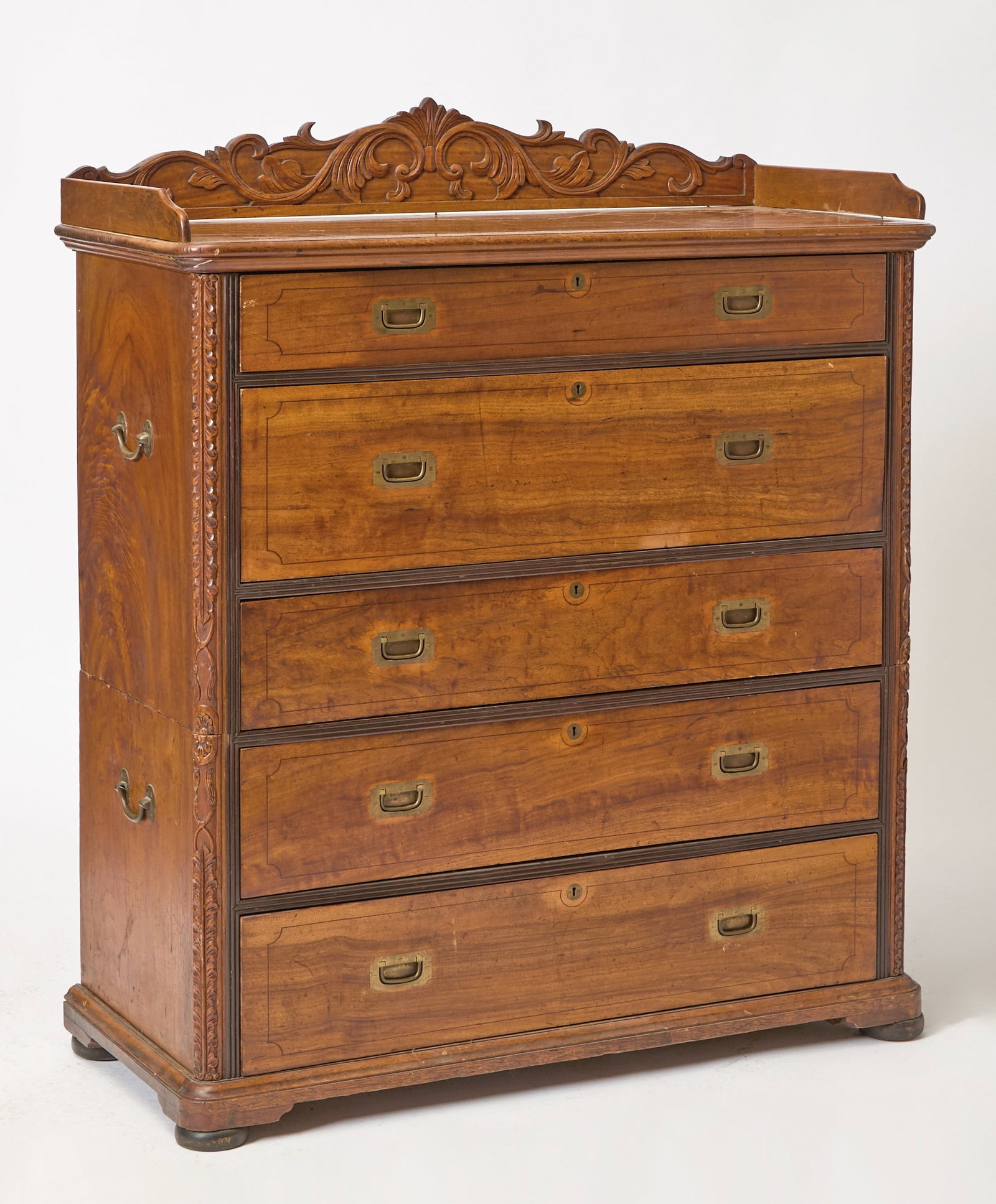 A China Trade Hardwood Secretary 19th Century: With original Label; constructed in two parts, with four drawers and fold-down writing surface with letter holders. (Overall 45 X 24 1/2 X 47 1/2 inches)