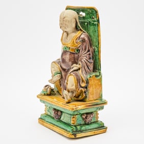 A Chinese Sancai Glazed Pottery Figure of Chen Wu 17th Century