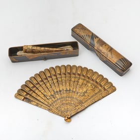 A Japanese Parcel Gilt Lacquer Box with Lacquer Fans 19th Century