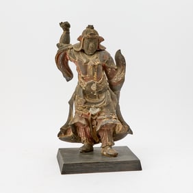 A Japanese Lacquered Wood Carving of a Guardian Deity Edo Period