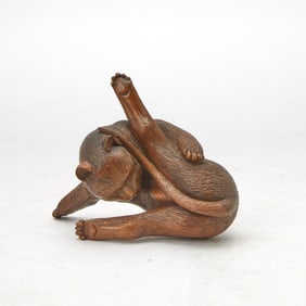 A Japanese Boxwood Sculpture of a Cat 19th Century