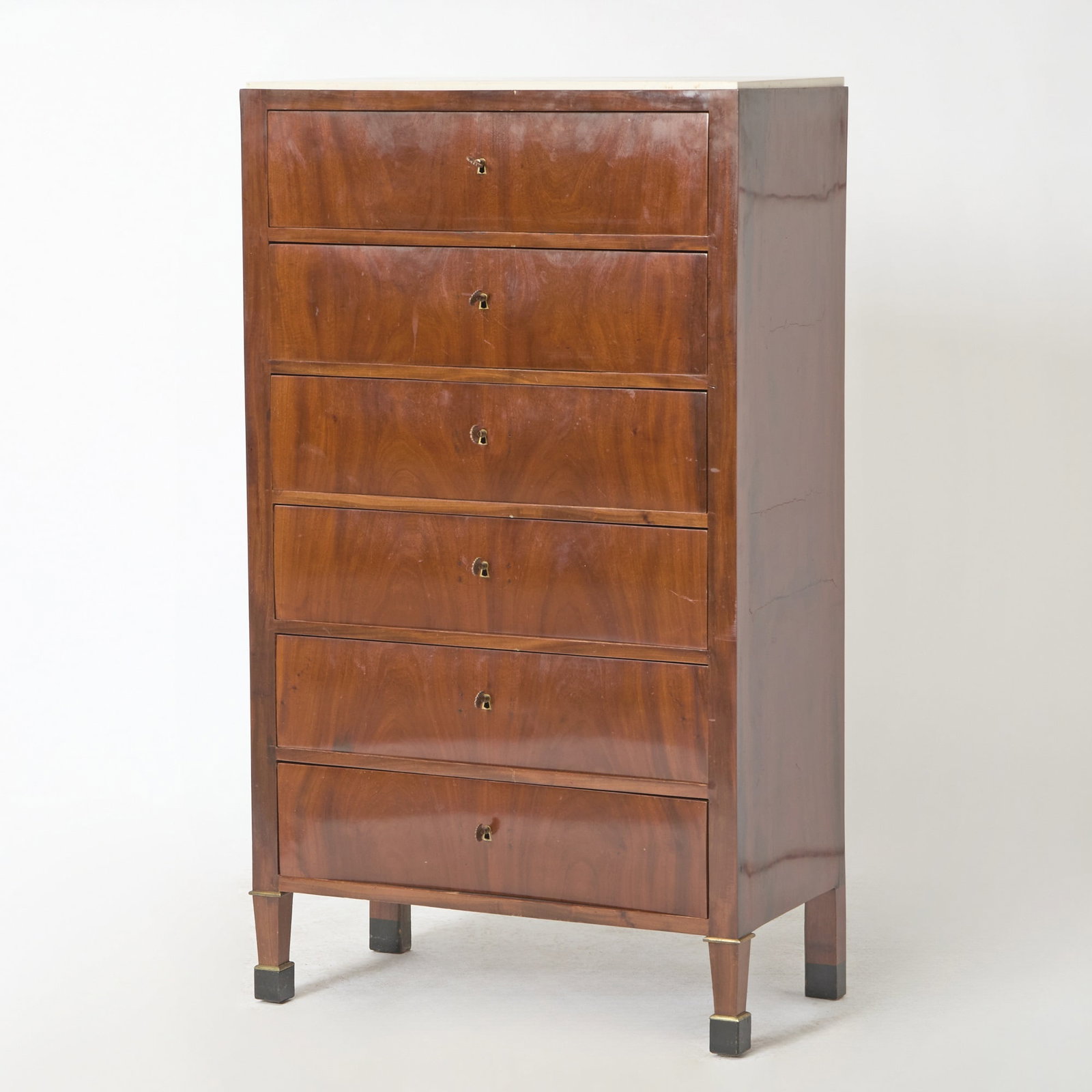 Marble Top Tall Chest of Drawers: Height 55 1/4 inches, width 31 7/8 inches, depth 16 inches. Cracks and warping to sides; some drawer fronts warped; some areas of infill