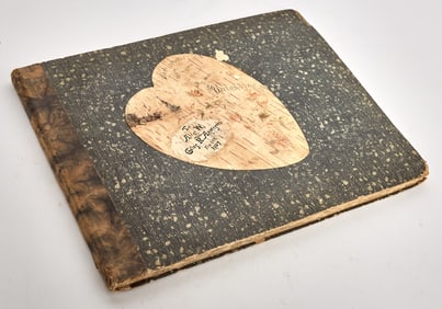 An elaborate manuscript Valentine's Day gift book recording a honeymoon to the 1904 World's Fair