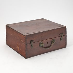 An early 20th-century sextant, in the original wooden case