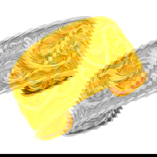 Ilias Lalaounis Gold 'Arabesque' Cuff Bangle Bracelet: 18 kt., signed Greece, with maker's mark, ap. 34.3 dwts. Inner circle 7 3/8 inches, with open back. With signed box. Bright rich yellow gold color. Width 1 1/2 to 1 1/8 inches.