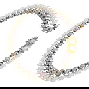 David Morris Double Strand South Sea and Tahitian Gray Cultured Pearl Necklace with Gold, Bicolor: 37 white pearls ap. 13.6 to 10.0 mm., 34 gray pearls ap. 14.2 to 9.6 mm., 2 white and gray pearls ap. 11.4 and 12.0 mm., 84 round diamonds ap. 2.75 cts., signed David Morris. Length 16 1/2 inches. Wit
