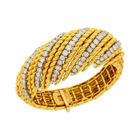 Van Cleef & Arpels Gold, Platinum and Diamond Bombé Bracelet