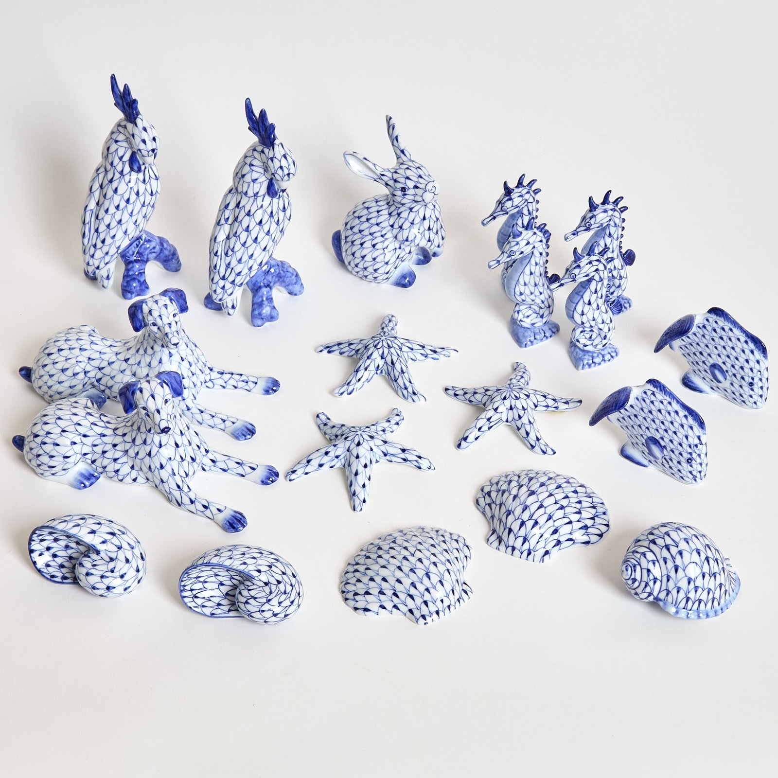 Collection of Andrea by Sadek Porcelain Animal Figures: Including birds, dogs, sea life, etc. Height of largest 8 1/2 inches. Approximately nineteen items.