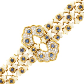 Tiffany & Co. Gold, Platinum, Carved White Coral, Cabochon Sapphire and Diamond Link Bracelet