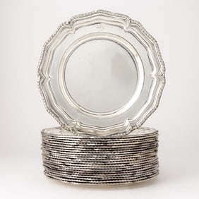 Assembled Set of Twenty-Two Silver Plated Service Plates