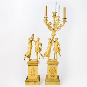 An Empire Ormolu Five-Light Figural Candelabrum, together with an incomplete identical example