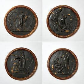 Set of Four Neoclassical Style Framed Parcel-Gilt Ebonized Wood Roundels