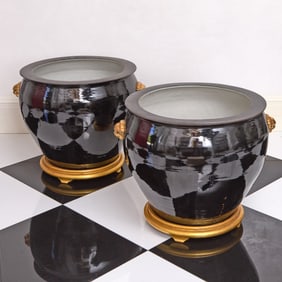 Large Pair of Chinese Black Glazed Porcelain Planters with Gilt Lion's Masks on Giltwood Stands
