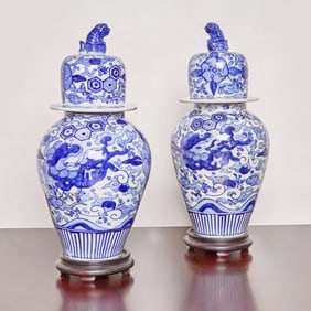 Pair of Japanese Blue and White Porcelain Baluster Vases and Covers