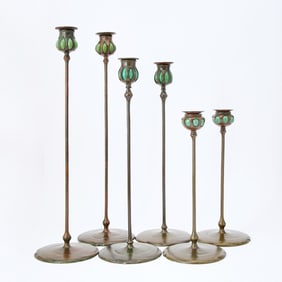 Group of Six Tiffany Studios Patinated Bronze and Green Favrile Glass Blow-Out Candlesticks