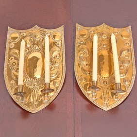 Pair of English Repoussé Brass Shield-Form Two-Arm Candle Sconces