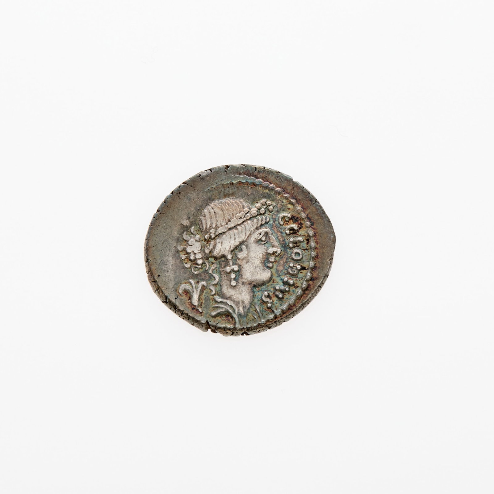 C. Clodius C. f. Vestalis. c. 41 B.C.E. AR Denarius (3.78g, 20mm).: OBVERSE: Bust of Flora (right) with legend C. CLODIUS C.F. around; REVERSE: Vestal Virgin, Claudia Quinta, seated (left) holding bowl with two handles known as a cymbium with legend VESTALIS; Craw. 51