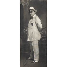 A signed portrait photograph of Enrico Caruso