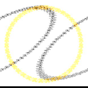 Tiffany & Co. Gold and Diamond 'X' Necklace: 18 kt., 36 round diamonds ap. 1.45 cts., signed T & Co., ap. 42.4 dwts. Length 15 5/8 inches. Diamonds: G-H-VS.Width 1/4 inch.