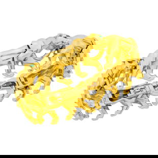 Cartier Gold and Emerald 'Nakoura' Panther Bracelet, France: 18 kt., 5 pear-shaped emerald eyes, signed Cartier, no. 63697C, with maker's mark and French assay mark, ap. 68.5 dwts. Length 6 inches. Width 3/4 inch.