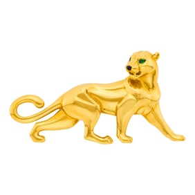 Cartier Gold, Emerald and Black Onyx Panther Clip-Brooch, France