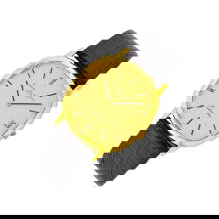 Audemars Piguet Gold Wristwatch: 18 kt., automatic, cushion-shaped gold-tone dial, gold-tone and black bar markers, date aperture, sapphire crystal, case dia. ap. 34.5 x 32 mm., black lizard strap with gold buckle, dial, movement and