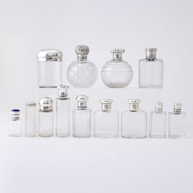 Group of Sterling Silver Mounted Glass Perfume and Dresser Bottles