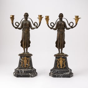 Pair of French Empire Style Gilt and Patinated Figural Two-Light Candelabra