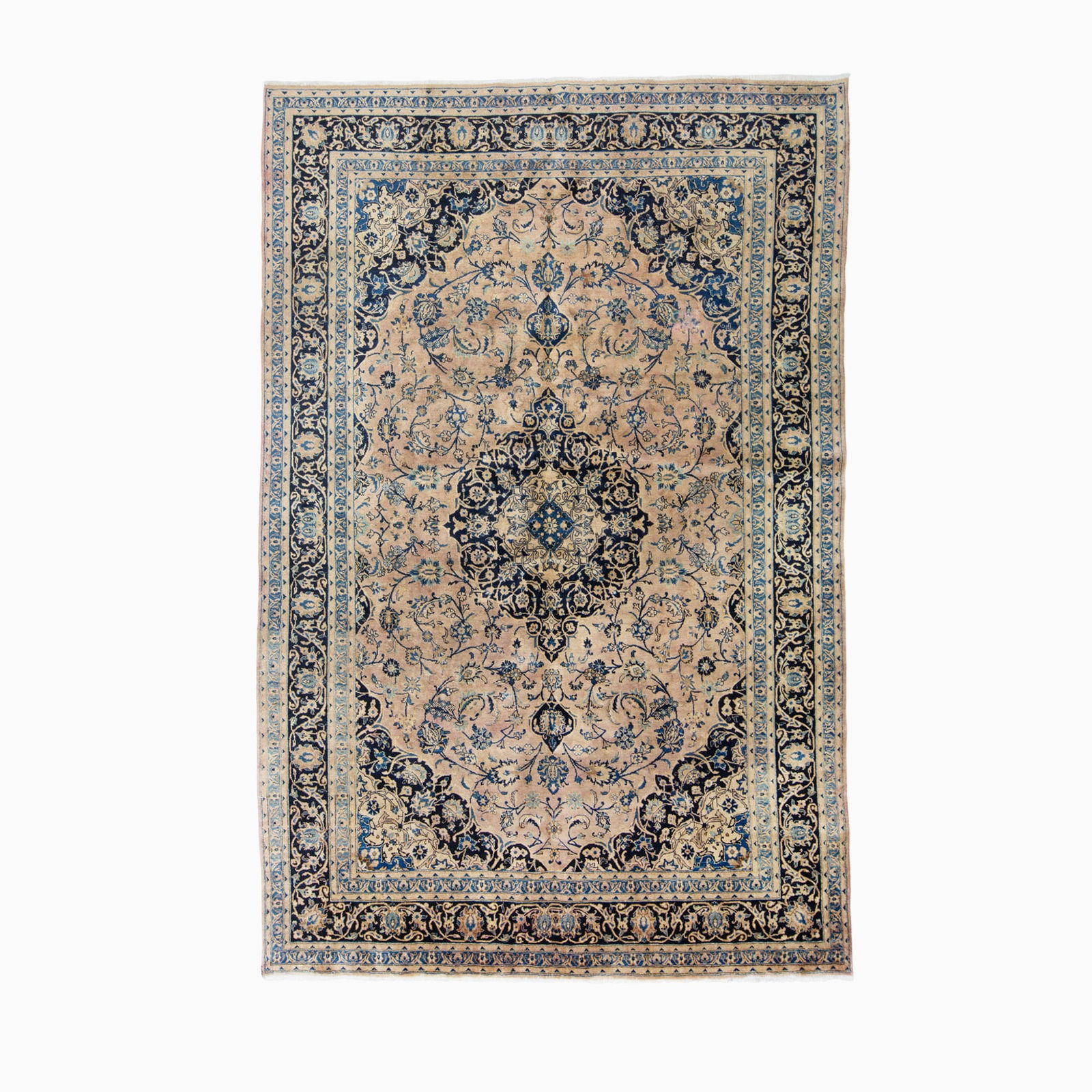 Mashad Carpet: East Iran, Late 20th century The central circular pendant medallion on the dusty rose field flanked by complementary spandrels is within a midnight blue palmette and meandering vine border.