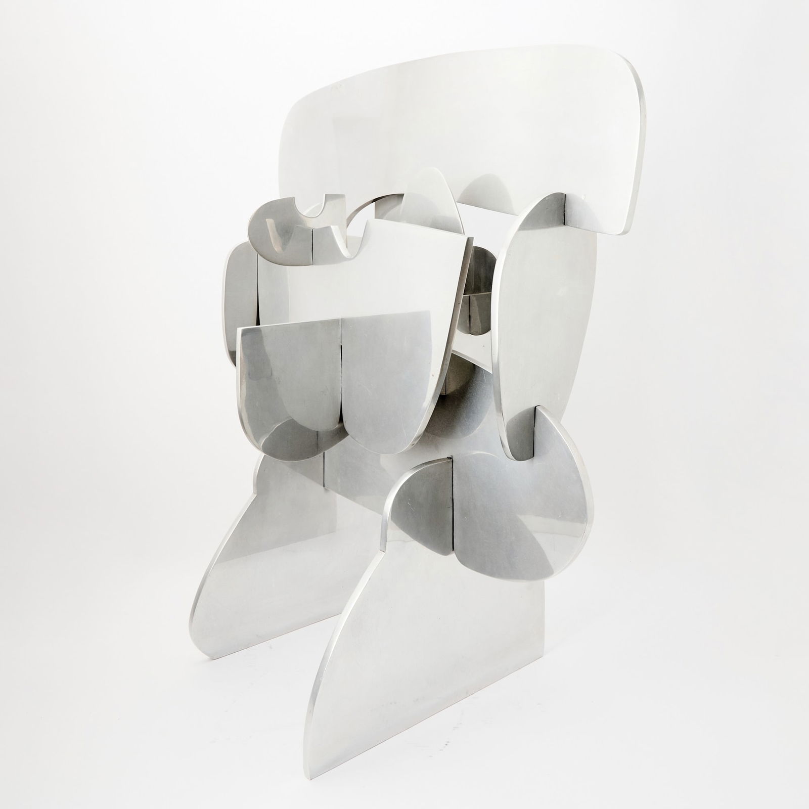 Philippe Scrive: American, b. 1927Untitled, 1971Signed Ph Scrive, dated 71, numbered 9/100 and stamped with Blanchet, Paris foundry mark on the lower edgePolished aluminum28 x 25 1/4 inches (71.1 x 64.1 c