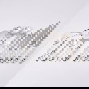 Georg Jensen Sterling Silver "Acorn" Pattern Flatware Service: Comprising: Twelve dinner forksTwelve salad forksTwelve dinner knivesTwelve butter knivesTwelve teaspoonsPair of salad serversCheese sliceCheese knifeGrape scissorsSugar tongsMaster