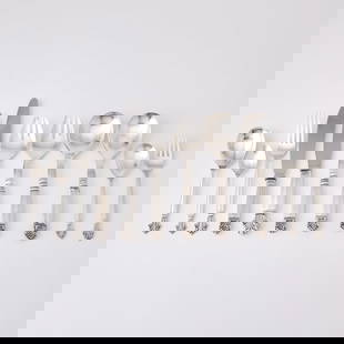 Assembled Georg Jensen Sterling Silver 'Acanthus' Pattern Flatware Service: Designed by Johan Rohde in 1917, most circa 1933-44, others post-1945 Comprising:Twelve dinner forks Twelve salad forksTwelve dessert spoons (le