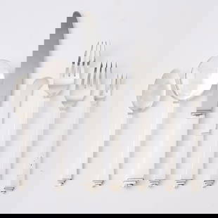 Georg Jensen Sterling Silver 'Pyramid' Pattern Flatware Service: Designed by Harald Nielsen in 1927, post-1945 Comprising: Fourteen dinner forksThirteen salad forksTwelve cocktail forksFourteen teaspoonsTwelve cream s