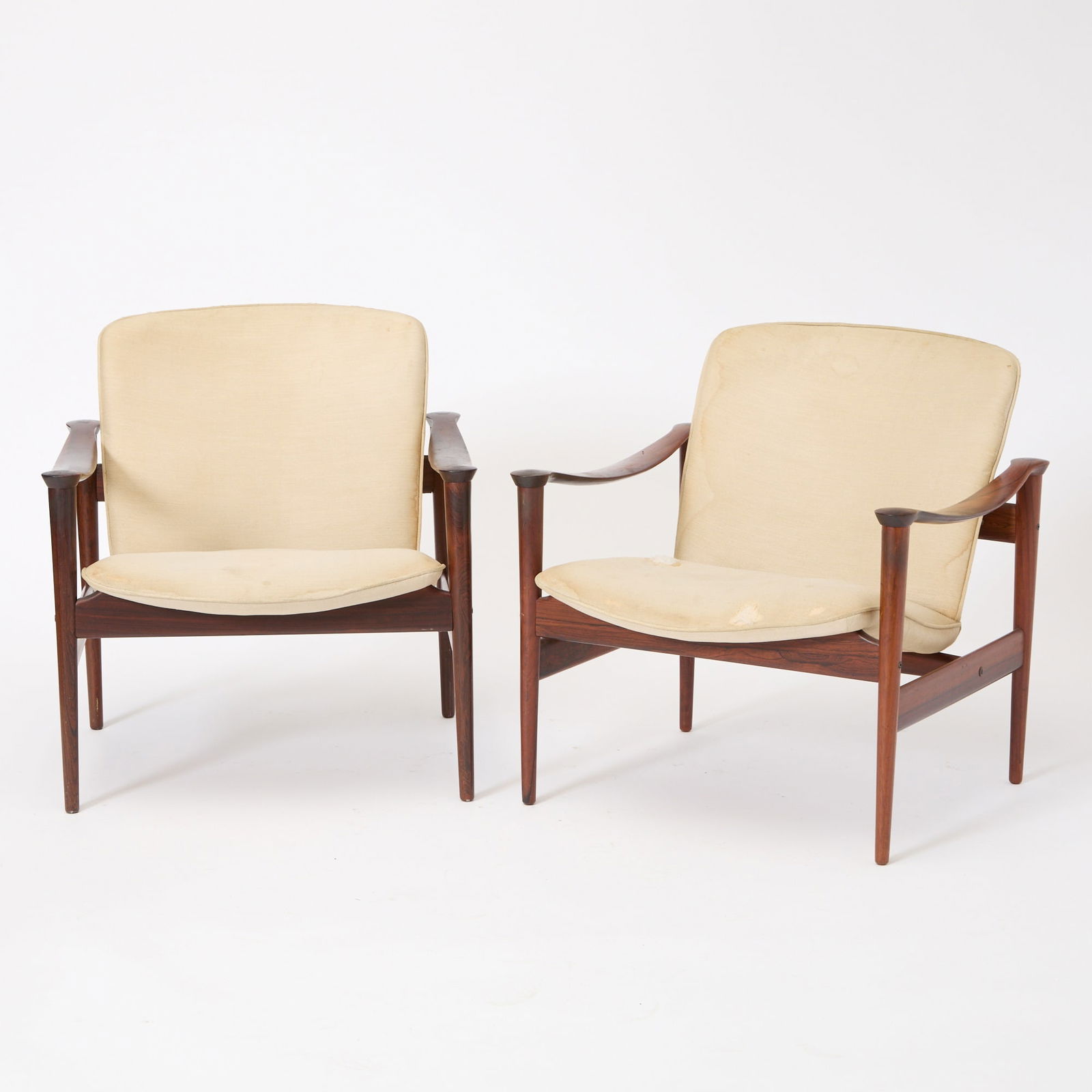 Pair of Frederik Kayser Upholstered Rosewood Armchairs: For Vatne Lenestolfabrikk, mid 20th century Height of back 30 1/2 inches, height of seat 16 inches, width 27 1/2 inches, depth 24 1/4 inches.