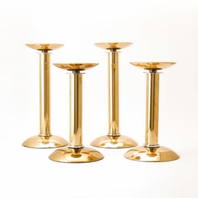 Set of Four Karl Springer Polished Brass and Chromed Metal Candlesticks