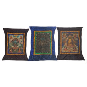 A Group of Three Tibetan Thangkas