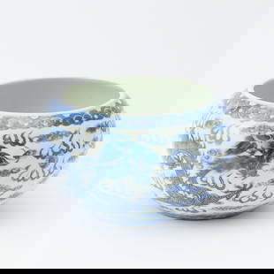 Chinese Blue and White Porcelain Bowl Qianlong Mark, Late Qing Dynasty: Decorated to show two dragons pursuing flaming pearls amongst cloud scrolls and flame wisps. (Diameter 10 inches)