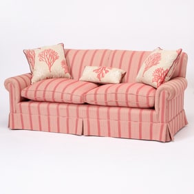 Upholstered Love Seat and Three Coral Throw Pillows