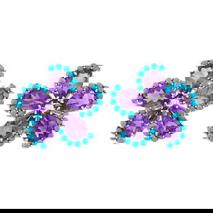Pair of White Gold, Amethyst, Turquoise and Diamond Flower Earrings: 10 pear-shaped amethysts ap. 23.50 cts., round cabochon turquoise, 2 round diamonds ap. .25 ct., ap. 13.2 dwts. gross. Test as 18 kt.Amethyts: bright medium to medium deep purple with pinkish