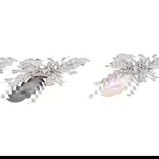 Pair of White Gold, South Sea and Tahitian Gray Cultured Pearl and Diamond Bee Pins: 18 kt., one bell-shaped white pearl ap. 12.0 x 11.7 mm., one drop-shaped gray pearl ap. 12.0 x 11.6 mm., 48 round diamonds ap. .95 ct., signed MXM, ap. 11.8 dwts. gross.  White pearl: white wi