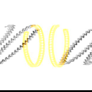 Cartier Pair of Gold and Diamond Hoop Earrings: 18 kt., 84 round diamonds ap. 2.50 cts., signed Cartier, no. 659574, with maker's marks, ap. 13 dwts. Diamonds: F-G-H-VS. Posts. Hoop diameters 1 1/2 inches. Widths just over 1/8 inch.<