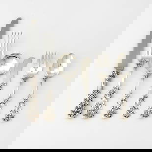 Reed & Barton Sterling Silver 'Francis I' Pattern Flatware Service: Pattern introduced in 1907 Comprising: Twelve dinner forks Twelve salad forks, length 6 1/8 inches Twelve round soup spoons, length 5 7/8 inches Twenty-four teaspoons Twelve dinner knives