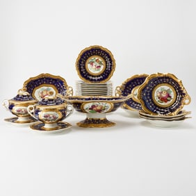 English Gilt and Transfer Decorated Cobalt Ground Porcelain Partial Dessert Service