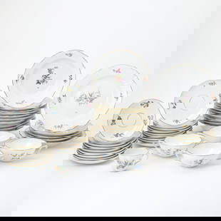Royal Copenhagen Porcelain 'Saxon Flower' Pattern Partial Dinner Service: Comprising: Two dinner plates, diameter 10 inches. Three luncheon plates, diameter 8 7/8 inches. Four bouillon cups Seventeen bouillon underplates Ten rim soup bowls One teacup and two saucers.