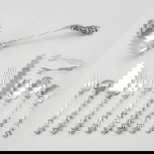 Reed & Barton Sterling Silver 'Francis I' Pattern Flatware Service: Pattern introduced in 1907 Comprising: Twelve dinner forks, length 7 1/8 inchesTwelve salad forksTwelve dinner knives, length 9 1/8 inchesTwenty-four teaspoonsSauce ladlePaté knife