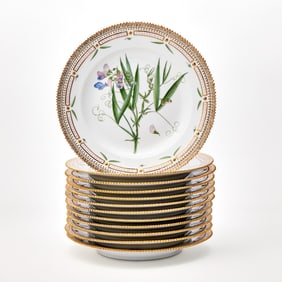 Set of Twelve Royal Copenhagen Porcelain Gilt and Hand-Painted 'Flora Danica' Dinner Plates